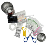 Trousse de secours pour chien avec compresses stériles, bandage et ciseaux.